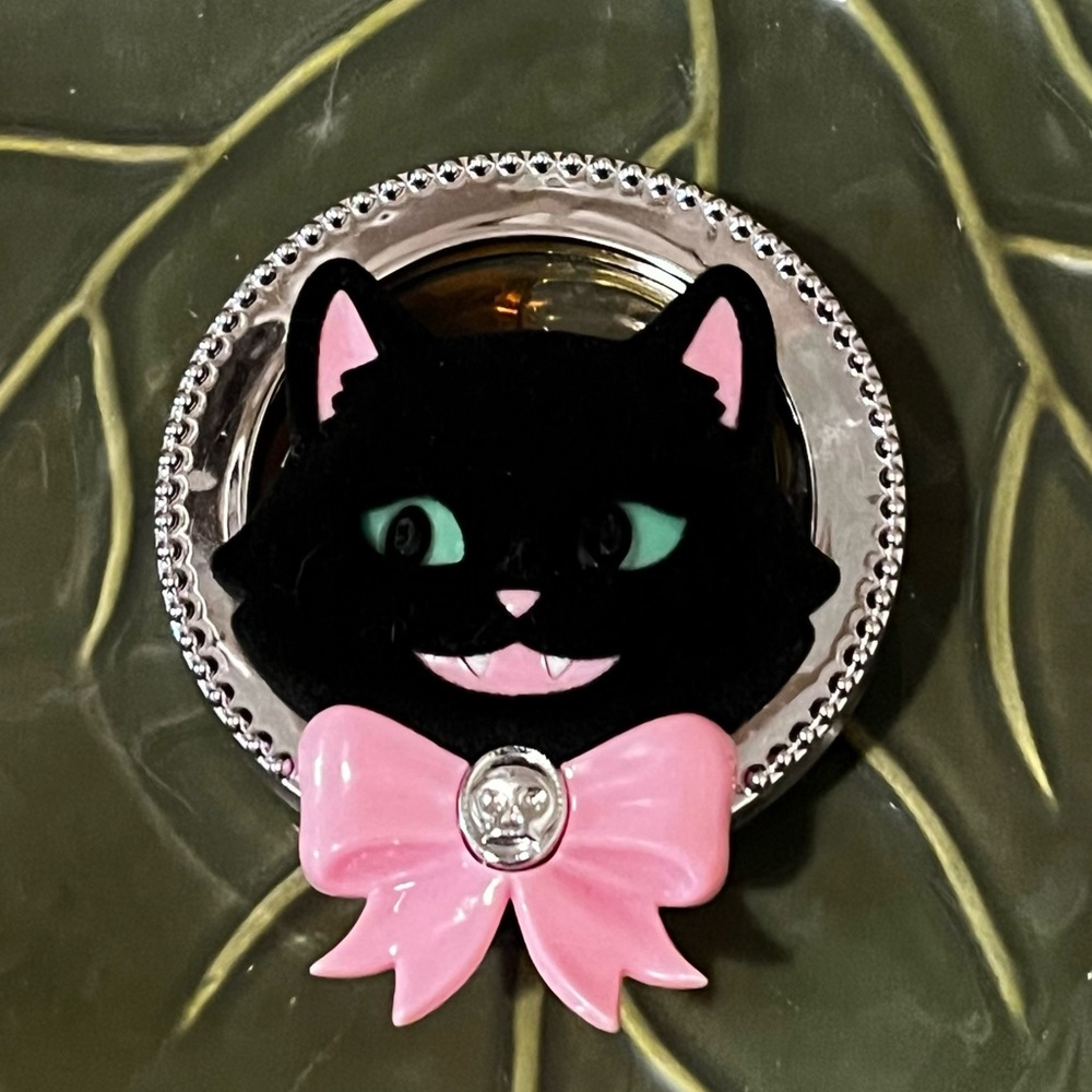 Bath & Body Works Black Cat with bow car fragrance holder.
